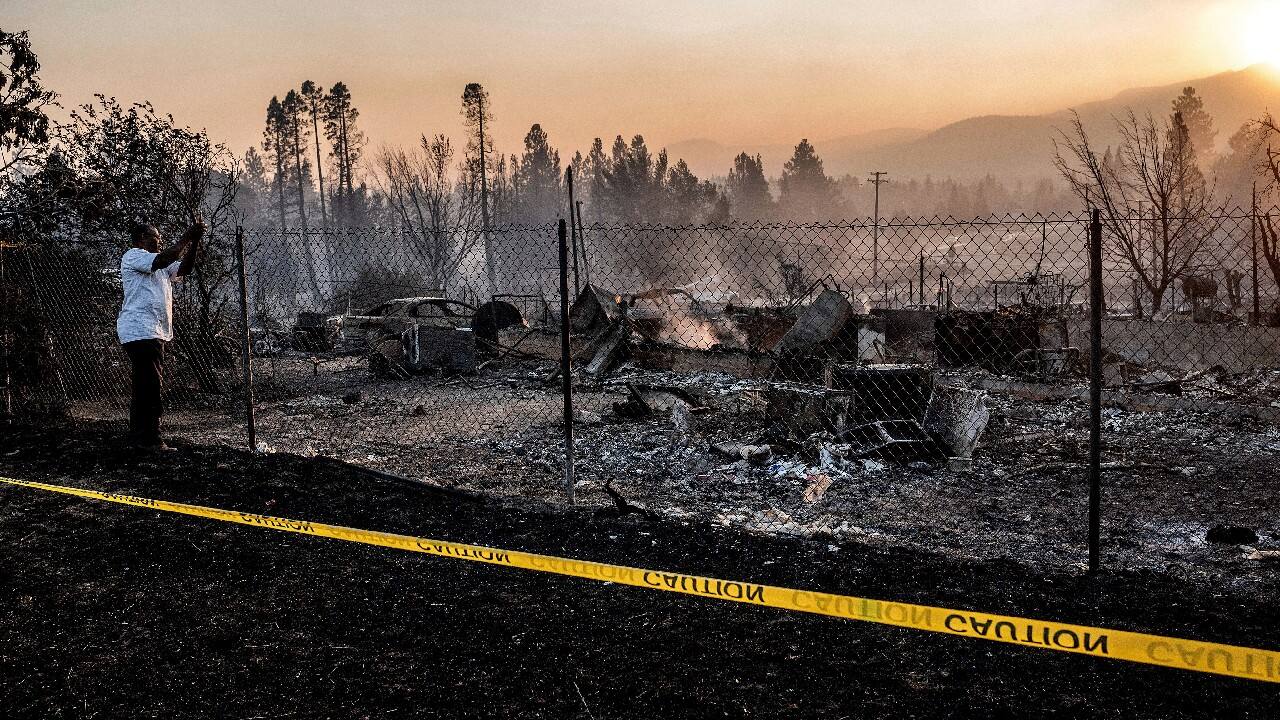 Calmer weather in Northern California helped firefighters battle a smoky wildfire threatening thousands of mountain homes on September 12, while remnants of last week's Pacific hurricane continued to produce thunderstorms that caused flash flooding in the southern part of the state, where crews made headway against another huge blaze. (Source: AP) Calmer weather in Northern California helped firefighters battle a smoky wildfire threatening thousands of mountain homes on September 12, while remnants of last week's Pacific hurricane continued to produce thunderstorms that caused flash flooding in the southern part of the state, where crews made headway against another huge blaze. (Source: AP)