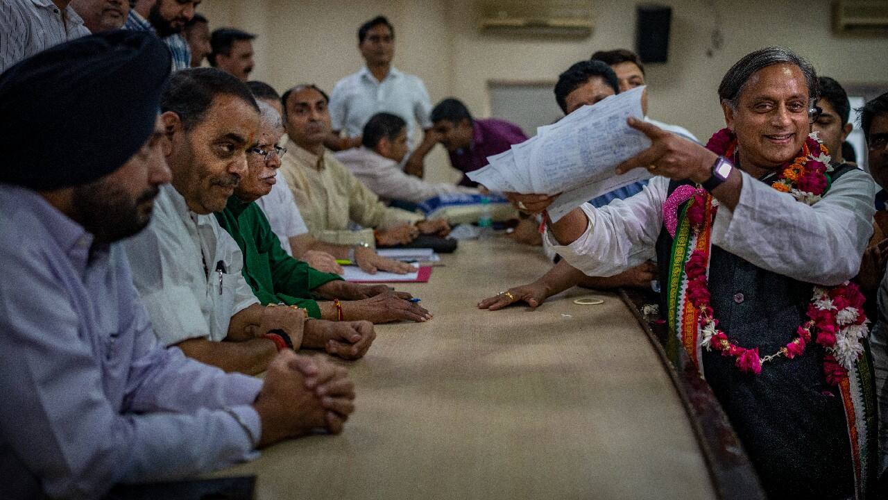 In Pics Congress Presidential Polls Shashi Tharoor Mallikarjun Kharge Kn Tripathi File 0504