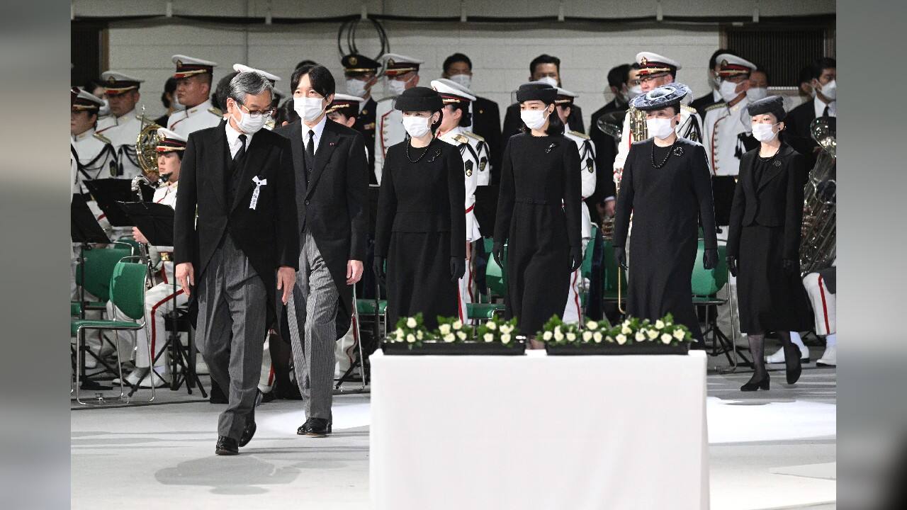 Japan's Crown Prince Akishino, second left, and Crown Princess Kiko, third left, arrive with other family members to attend the state funeral of former Japanese Prime Minister Shinzo Abe at the Nippon Budokan in Tokyo. (Source: AP)