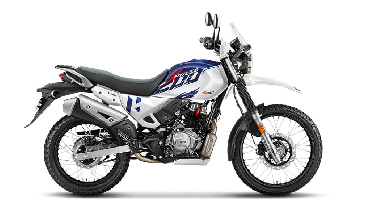 Hero Xpulse 200 4V | Rs 1.37 lakh | Now we come to the Hero Xpulse 200 4V. It really is a mouthful, but the TVS Apache series, I think, has it worse. I’ll get right into why I called the Xpulse a dual-sport motorcycle and not an ADV. Unlike the Honda CB200X, the Xpulse doesn’t get a fairing, it is thinner and it is taller. It gets much better ground clearance than the CB200X and the lack of a fairing means the wind bellows into you on your sides and on your legs. The windscreen does help a little but that’s like putting a handkerchief on your face when you would really like a bedsheet. This doesn’t mean it is a bad bike, however. The thinner Xpulse can also traverse more offbeat areas than the CB200X thanks to the bigger 21-inch/18-inch front and rear wheel combo. The exhaust, too, sits higher up so traversing through deeper water is easier. Powering the Xpulse 200 4V is an oil-cooled 199.6cc engine that churns out 19.1 hp of maximum power at 5,800 rpm and 17.35 Nm of peak torque at 6,500 rpm. Suspension comes from conventional forks up front and a monoshock at the rear while braking is handled by discs at both ends and single-channel ABS. (Image: Hero)