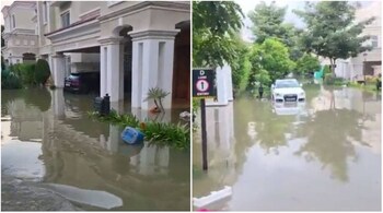 Videos of the flooded exclusive gated community have been doing rounds on social media which show luxury cars floating in the floodwaters. (Screengrab from videos shared by @hvgoenka, @VamanJagan on Twitter)