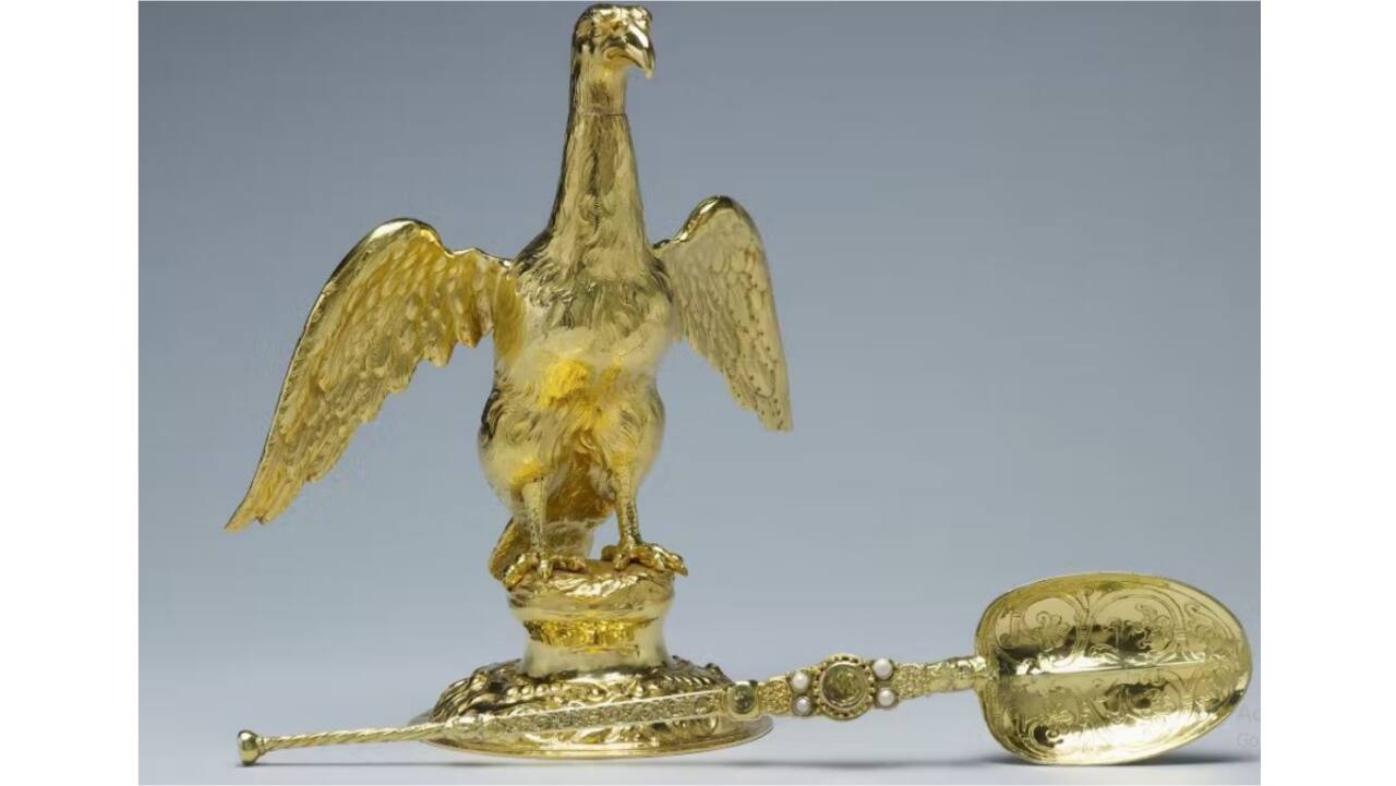 The gold Ampulla is an eagle-shaped vessel that holds the consecrated oil used in coronation ceremonies. The eagle's head comes off to allow oil to be poured into the vessel.The design is based on a legend that the Virgin Mary appeared to medieval English saint Thomas Becket and handed him a golden eagle and oil to anoint future English kings. (Image credit: Historic Royal Palaces)