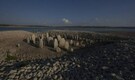 ‘If you see me, weep’: Drought uncovers old warnings, sunken monuments