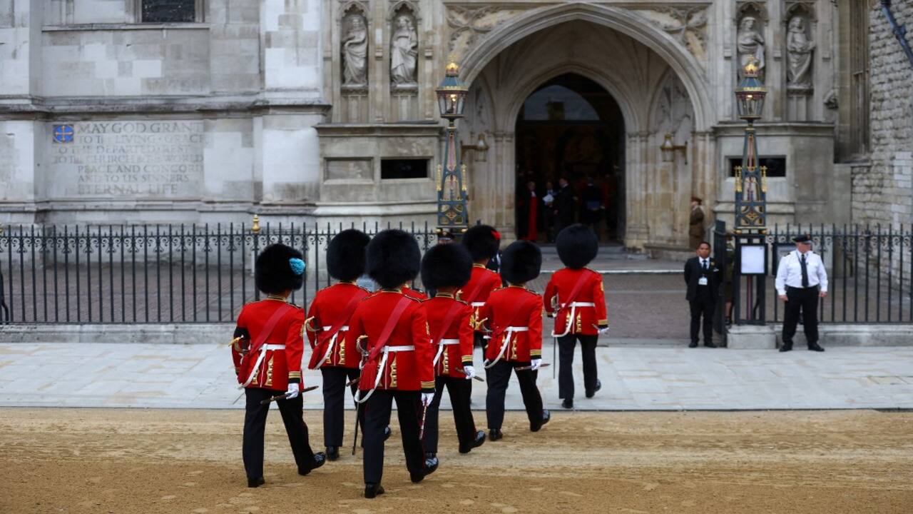 Soldiers in ceremonial uniform walk into Westminster Abbey in London on September 19, 2022, ahead of the State Funeral Service of Britain's Queen Elizabeth II. 