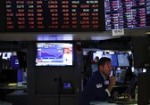 Wall Street opens flat despite solid GDP growth while dollar, yields tick upwards