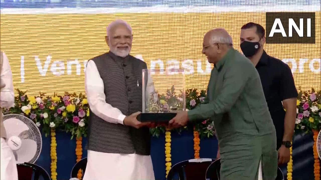 PM Modi was felicitated and presented with a memento by Gujarat Chief Minister Bhupendra Patel and Tata Sons chairperson N Chandrasekaran at the occasion. (Image: ANI)