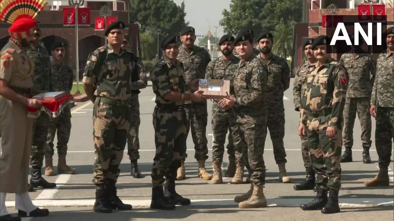 Border Security Force (BSF) and Pakistan Rangers also exchanged sweets at the Attari-Wagah border. The forces exchanges sweets on the occasion of Diwali, the festival of lights, which is celebrated all over India. (Image: Twitter @ANI)