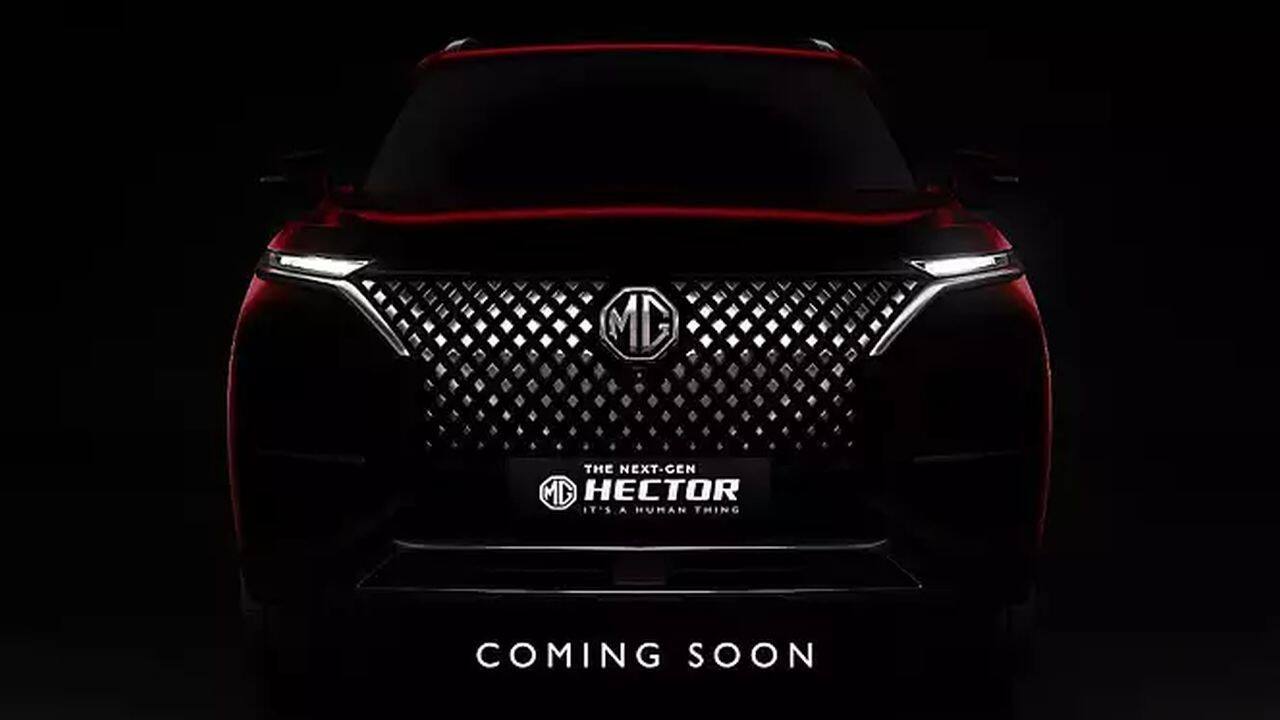 2022 MG Hector | British manufacturer Morris Garages (MG) is all set to launch their latest iteration of the MG Hector and with the reveal just around the corner has been giving us teasers. The latest of these is a shot of the interiors, not to mention the number of test mules being spotted and pictured. The MG Hector has been on sale in India since 2019 and has already gone under the knife once. This will be the second facelift and we can expect changes to the exteriors as well. The front will get a revised diamond mesh grille, repositioned headlamps and a revised bumper. Rear styling is expected to remain the same, but most of the changes are expected to be on the interiors. There is a new 14-inch HD touchscreen infotainment system with wireless Apple CarPlay and Android Auto, new graphics on the 7-inch digital instrument cluster as well as a refreshed cabin design that will make the Hector look all new. The powertrain is expected to remain unchanged with two petrol options, one of which features mild-hybrid tech and a larger 2-litre turbo-diesel capable of producing 170 hp of maximum power. Of course, the top variants of the Hector will also get ADAS, which increases the safety factor of the SUV. (Image: MG Motor)