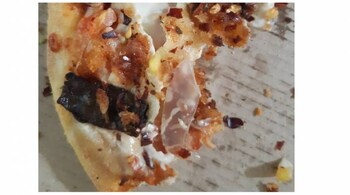 The Twitter user claimed he found 2 to 3 pieces of glass shards in the Domino's pizza. (Image: @kolluri_arun/Twitter)
