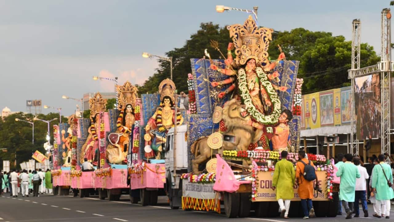 The community puja committees took part in a colourful parade on Red Road, showcasing the brilliant craftsmanship which was on display during the five-day festival. (Image credit: @ATANUBA22595125/Twitter)