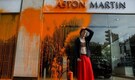 Watch: Climate activists spray paint over Aston Martin showroom in London, UK vows action