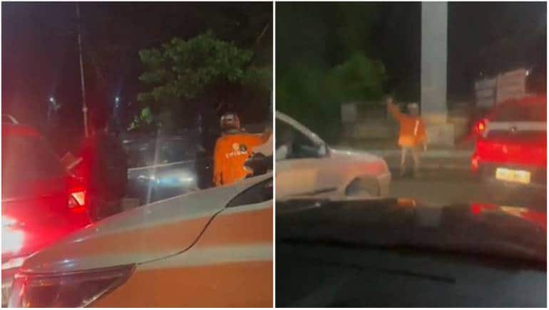 'Delivery hero': Swiggy executive turns traffic police to clear congestion, wins hearts | Watch