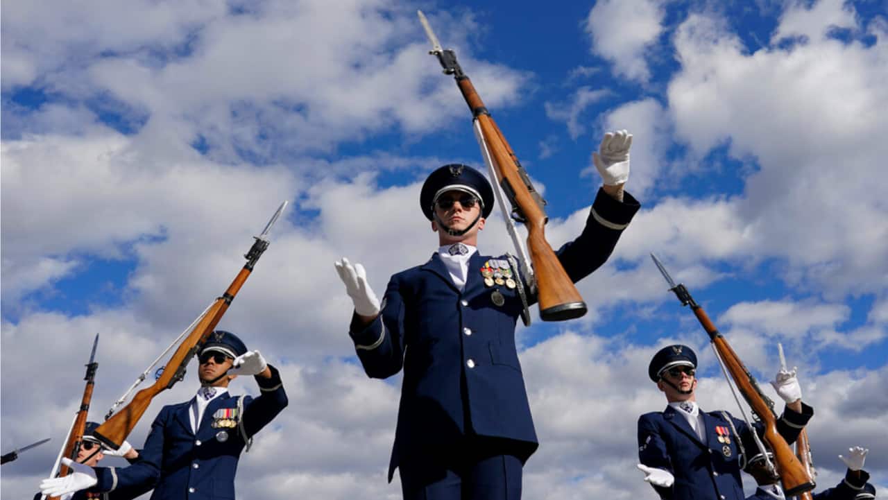 Members of the US Air Force Honor Guard Drill Team, lead Master Sgt. Antonio Lofton, perform during the Joint Service Drill-Off at the Lincoln Memorial in Washington.