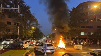 Protests following the death of Mahsa Amini in downtown Tehran on Sept 19 (AP Photo)