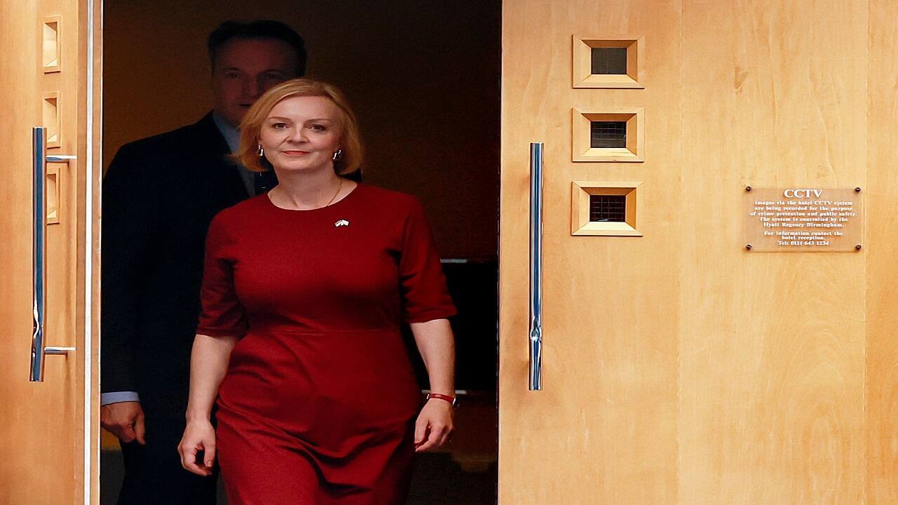 Liz Truss drops tax cut for top UK earners to fend off rebellion