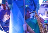 Man plays saxophone during complex awake brain surgery
