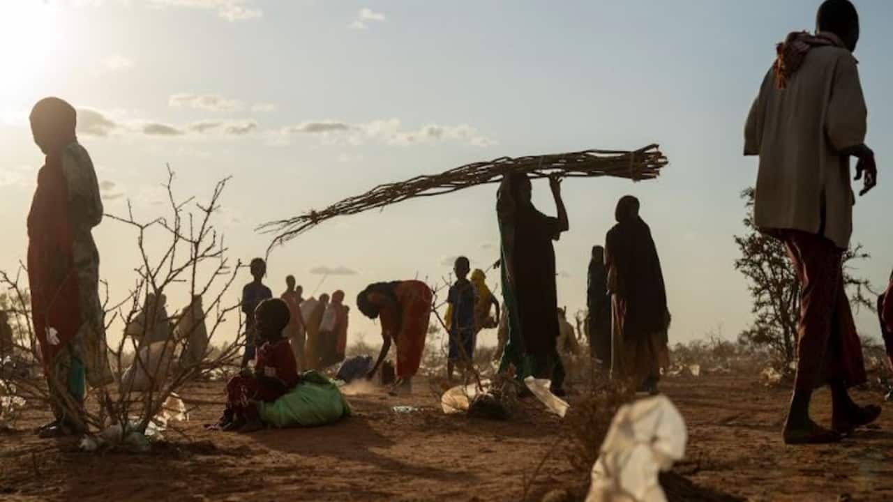 Somalis who have been displaced settle at a camp on the outskirts of Dollow, Somalia Tuesday, Sept. 19, 2022. Somalia has long known droughts, but the climate shocks are now coming more frequently, leaving less room to recover and prepare for the next. (AP Photo/Jerome Delay)