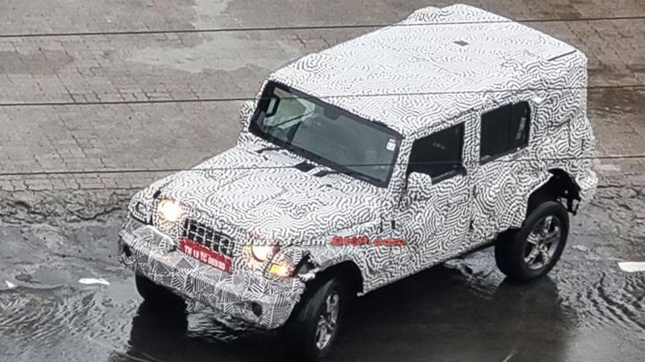 Mahindra Thar 5-door | Another vehicle that has been spied a lot recently is the Mahindra Thar, with two more doors. The current 3-door variant is doing fairly well for itself and it is no surprise that a 5-door variant is being added to the lineup. In terms of design, like the Jimny at the top of this list, the 5-door Thar will be identical to the 3-door variant save for the two extra doors on the side. The latest spy shots of the SUV also showcase a sunroof, something that the 3-door misses out on. Power for the new Thar should come from the same petrol and diesel options. The 2-litre turbo-petrol produces 150 hp of maximum power and 300 Nm of torque, while the 2.2-litre diesel produces 130 hp and 300 Nm. Like the Jimny, the Mahindra Thar will also go up against the Force Gurkha when it launches next year. The first showing is expected to be at the 2023 Auto Expo. (Image source: TeamBHP)