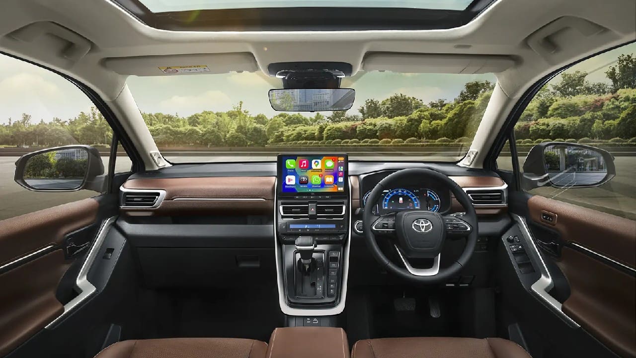 On the inside, you get to see an all-new multilevel dashboard finished in a black-and-tan theme. Bang in the middle is a 10.1-inch floating touchscreen infotainment centre, and the driver get side a multi-functional steering wheel and semi-digital instrument cluster. (Image: Toyota Bharat)