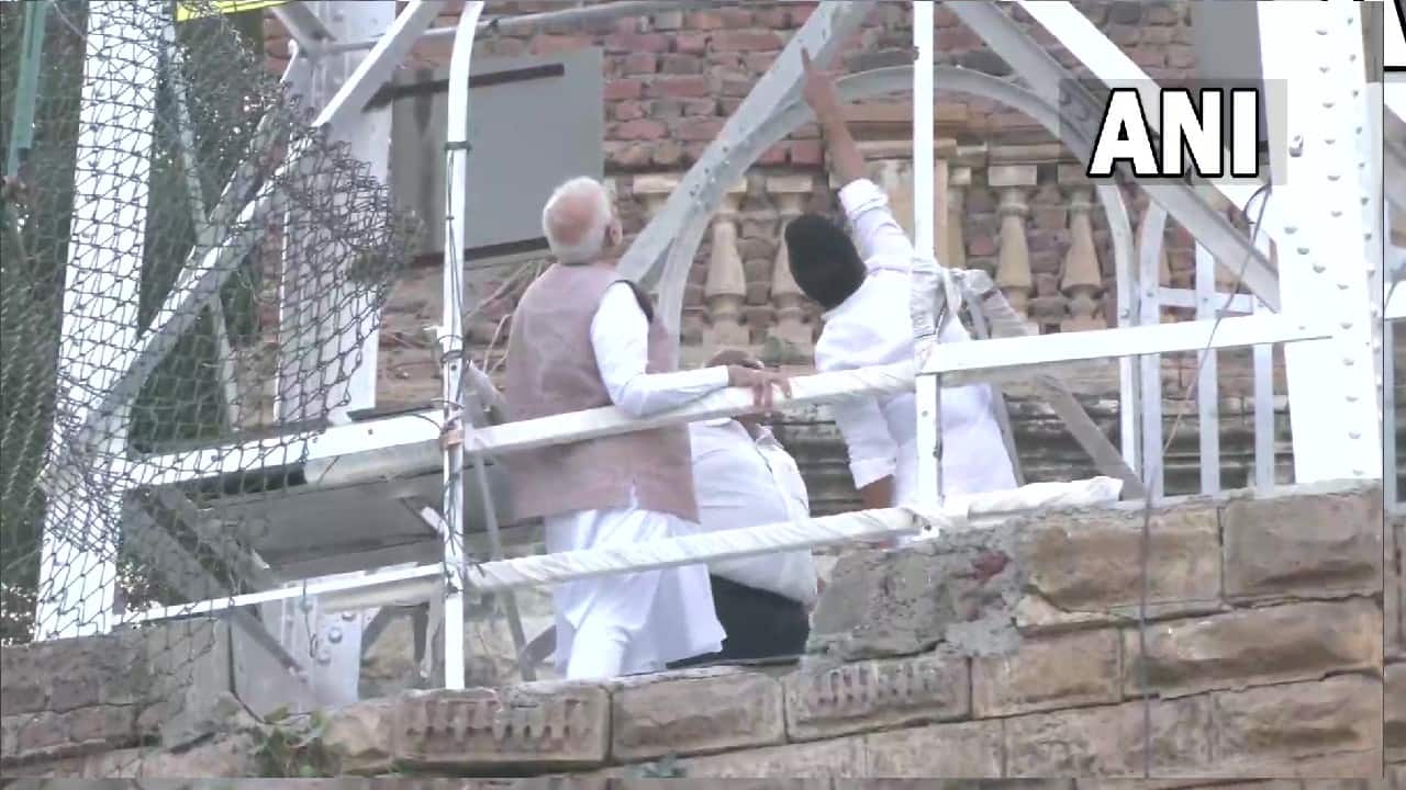 At least 135 people, including women and children, were killed and over 100 are receiving treatment for the injuries sustained after a cable suspension bridge in Morbi town collapsed on October 30, plunging people into the Machchhu River. (Image: Twitter @ANI)