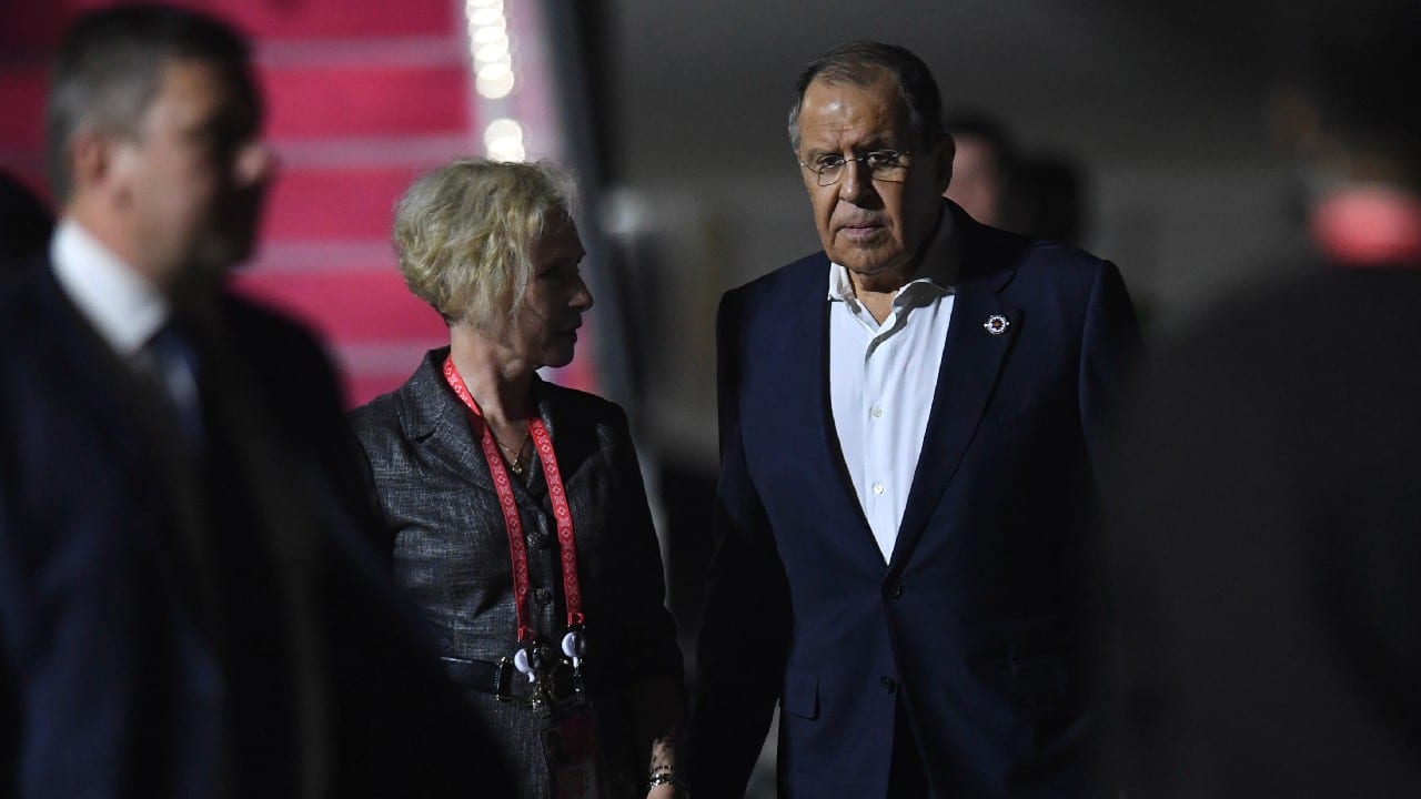 Russian Foreign Minister Sergey Lavrov, right, talks to Russian Ambassador to Indonesia Lyudmila Vorobyova upon his arrival to attend the G20 Summit at Ngurah Rai International Airport in Bali, Indonesia, November 13. (Image: AP) (With inputs from agencies)