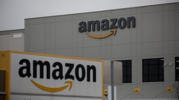 Amazon.com Inc. signage is displayed in front of a warehouse in the Staten Island borough of New York, U.S., on Tuesday, March 31, 2020. Some employees at Amazons Staten Island warehouse walked off the job on Monday, calling for the company to shut the facility for extended cleaning after they say a number of their colleagues were diagnosed with Covid-19.