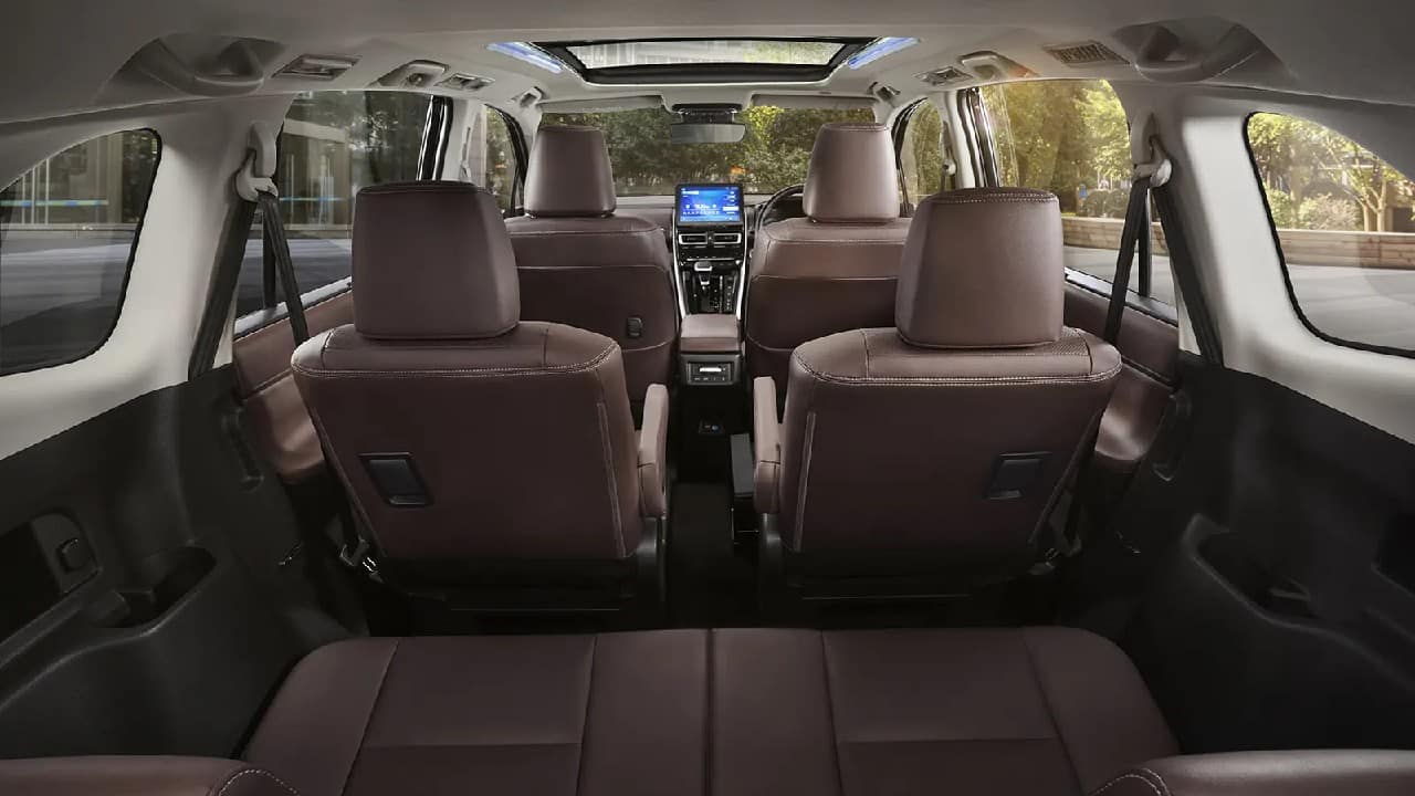 The Toyota will be available two seating arrangements, a 7-seater and 8-seater. The 7-seater variant gets two captain seats in the middle row instead of a bench. The USP here is that the seats come with an ottoman feature, the powered, sliding seats with footrests that luxury cars boast of but have never seen before in this segment. (Image: Toyota Bharat)
