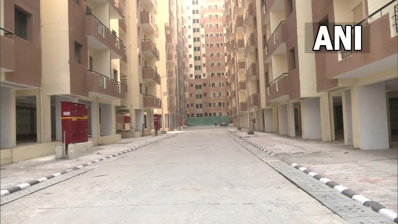 Under the Kalkaji Extension Project, in-situ Slum Rehabilitation of three slum clusters namely Bhoomiheen Camp, Navjeevan camp, and Jawahar camp located at Kalkaji is being taken up in a phased manner. Under Phase I, 3024 EWS flats at the nearby vacant commercial center site have been constructed. The Jhuggi Jhopri site at Bhoomiheen Camp will be vacated by rehabilitating eligible households of Bhoomiheen camp to the newly constructed EWS flats. (Image: ANI)