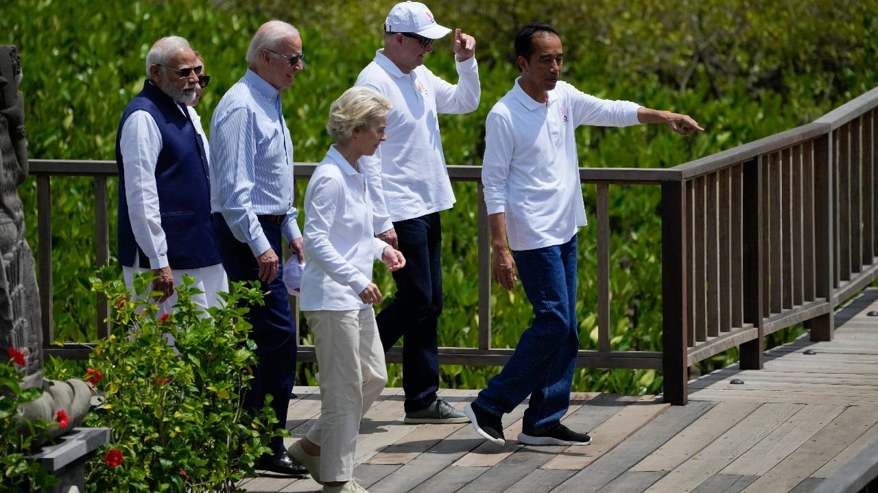 Indonesia President Joko Widodo walks with India Prime Minister Narendra Modi, U.S. President Joe Biden, Australian Prime Minister Anthony Albanese and European Commission President Ursula von der Leyen as they visit a mangrove seeding area as part of the G20 Summit in Denpasar, Bali, Indonesia. (Image: AP)