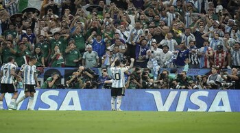 Argentina's Lionel Messi celebrates after scoring the first goal during the World Cup group C soccer match between Argentina and Mexico, at the Lusail Stadium in Lusail, Qatar, Saturday, Nov. 26, 2022. (AP Photo/Hassan Ammar)