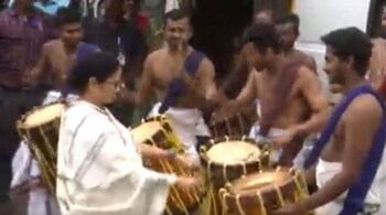 Mamata Banerjee plays drums at at the family function of West Bengal Governor La Ganesan, in Chennai, on Thursday. (Screengrab from ANI video)