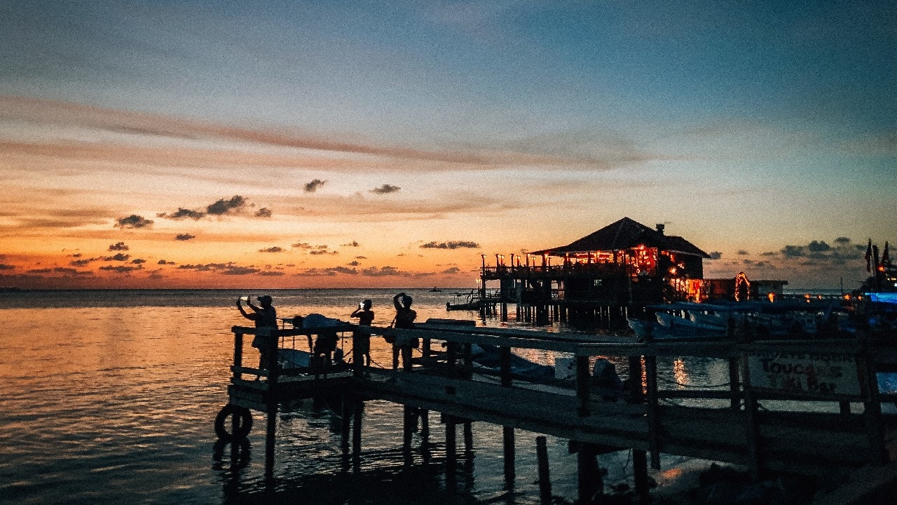 Roatán, Honduras | Monthly cost of living: $570 | Roatán, an island in the Caribbean, is the largest of Honduras' three Bay Islands, stretching about 65 kilometres long. The island is surrounded by the Mesoamerican Barrier reef, the largest in the Caribbean Sea. Roatán has become an important cruise ship, scuba diving and eco-tourism destination in Honduras. (Image: Unsplash)