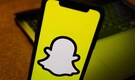 Snap swings to quarterly net loss, expects lower Q1 revenue; shares fall