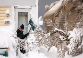US digs out from deadly weekend blizzard; warming could bring rain &amp; slush