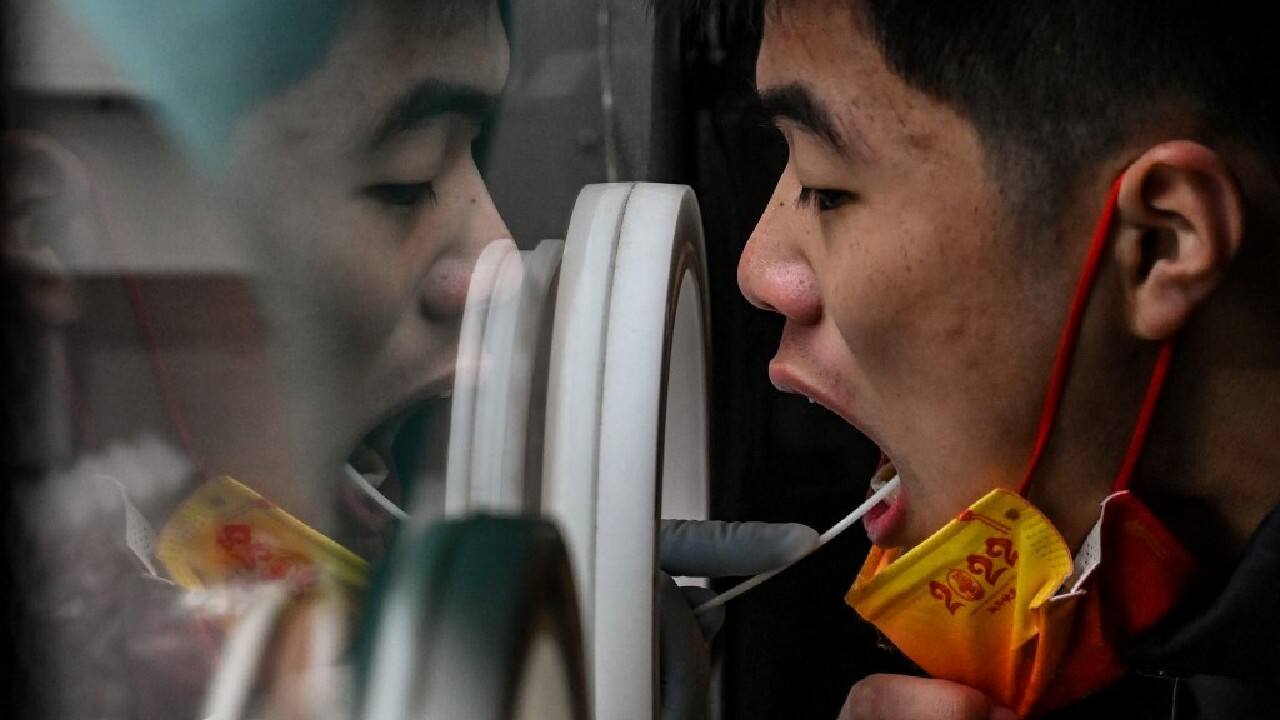 A cleaner and a nurse at the first hospital told AFP there were several deaths per day since the government's sudden decision at the beginning of the month to lift health restrictions and end mass testing. It was not clear if all of the deaths were related to the virus. (Image: AFP)