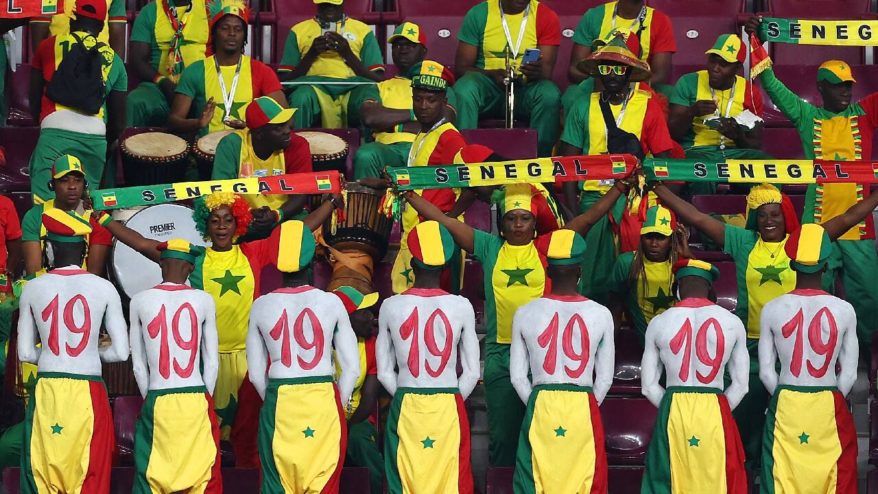 Senegal fans paid tribute to national hero Papa Bouba Diop on November 29 during a match between Ecuador and Senegal. The No. 19 was to honor Papa Bouba Diop, the Senegal midfielder who scored the winning goal against defending champion France in the opening game of the 2002 World Cup. It was one of Senegal’s greatest soccer moments and a victory that started that team’s run to the quarterfinals — still Senegal’s best performance. (Image: Twitter @FIFAcom)