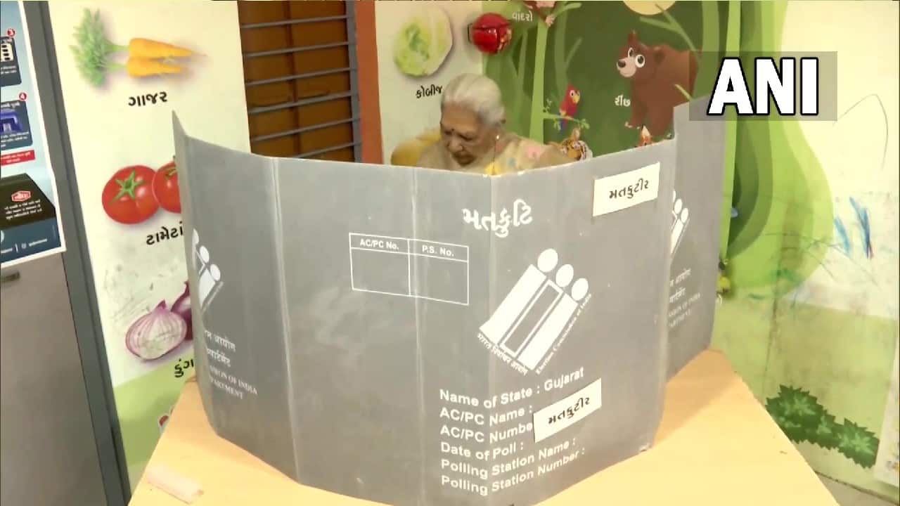 Uttar Pradesh Governor Anandiben Patel cast her vote for the second phase of Gujarat Assembly polls. (Image: Twitter @ANI)