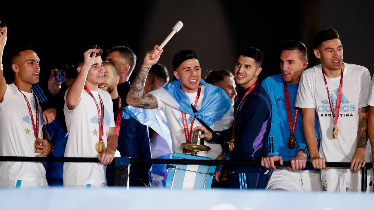 The bus moved at a snail’s pace as fans, many of whom were waving Argentine flags, swarmed the bus on a highway, eager for a glimpse of the players as law enforcement officers tried to keep them at bay. (Image: Reuters)