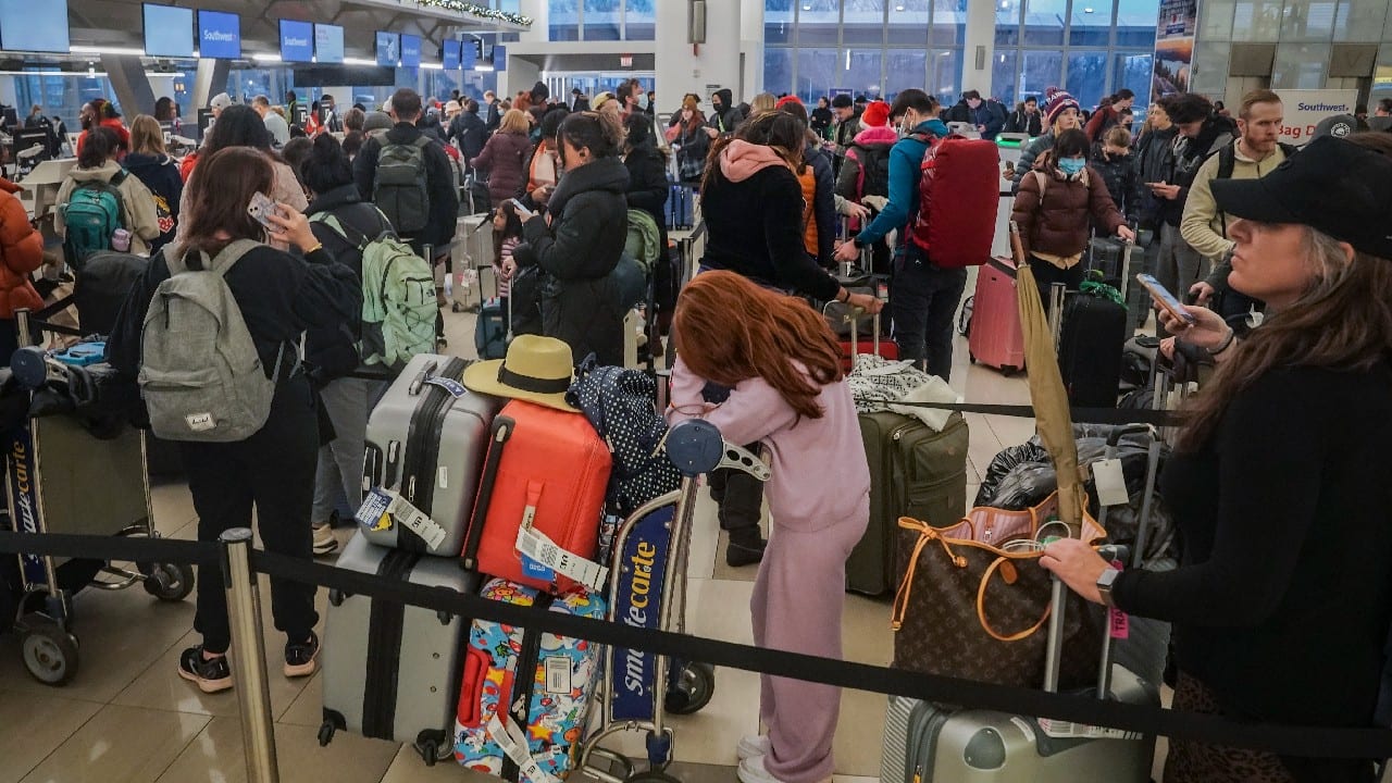 Travelers’ weather woes continued, with hundreds of flight cancellations already and more expected after a bomb cyclone — when atmospheric pressure drops very quickly in a strong storm — developed near the Great Lakes, stirring up blizzard conditions, including heavy winds and snow. (Image: AP)
