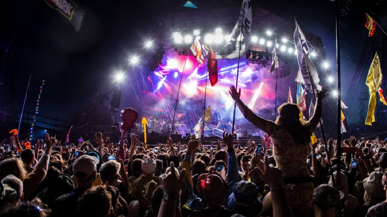 After keeping the world at arm’s length for roughly two years, the entertainment world could finally get more personal again in 2022. (Image: AP)