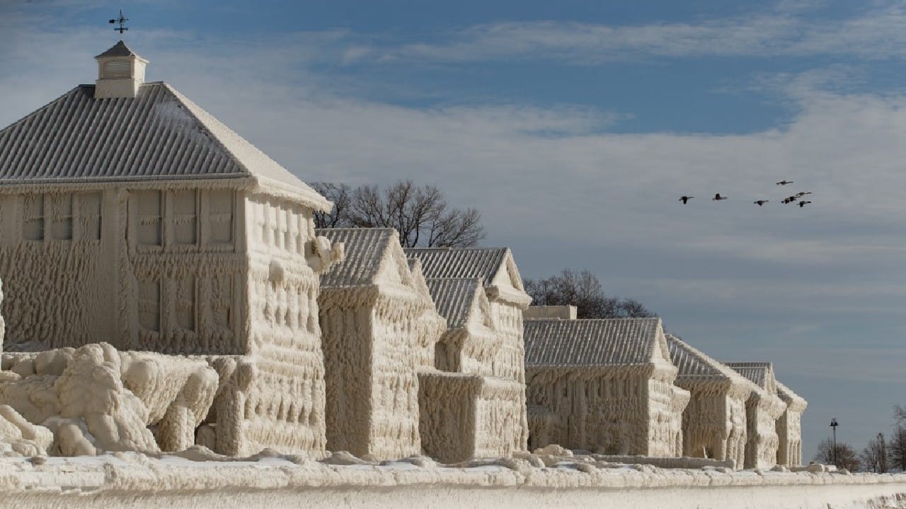 Winter Wonderland| Homes and piers covered in ice after winter storm in ...