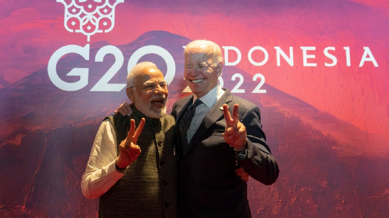 U.S. President Joe Biden, right, gestures with India's Prime Minister Narendra Modi before the Partnership for Global Infrastructure and Investment meeting at the G20 summit, November 15, in Nusa Dua, Bali, Indonesia. (Image: AP)