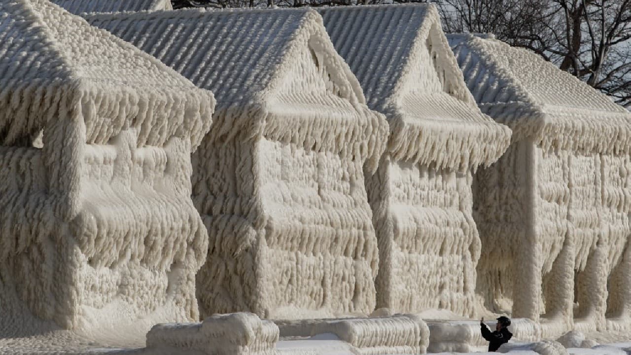 Ice-covered piers and homes after a deadly blizzard hit upstate New York and Canada. Images showed a row of houses fully crystallized in ice, turning Ontario's Fort Erie town into a fairytale 'ice town'. (Image: AFP) Ice-covered piers and homes after a deadly blizzard hit upstate New York and Canada. Images showed a row of houses fully crystallized in ice, turning Ontario's Fort Erie town into a fairytale 'ice town'. (Image: AFP)
