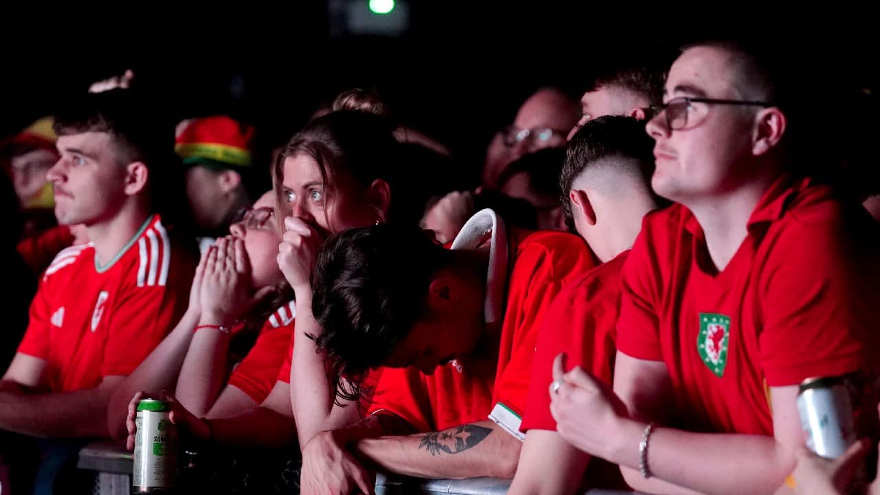 Wales fans are left heartbroken after the team being knocked out of the tournament on November 29. They lost 3-0 to England at the Ahmad bin Ali Stadium in Al Rayyan, Qatar. Wales, which was playing at the World Cup for the first time in 64 years, finished last in the group and was eliminated. (Image: AP)