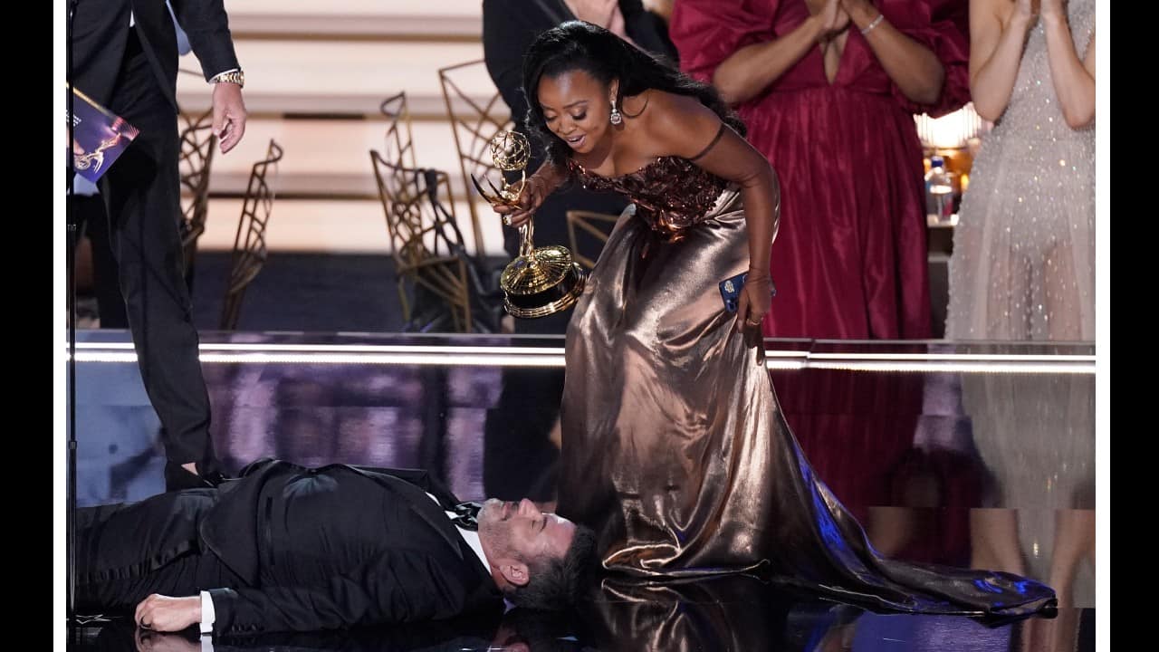 Jimmy Kimmel, pretending to be unconscious on the Emmys stage, overshadowed a win by beloved “Abbott Elementary” creator and star Quinta Brunson. (Image: AP)