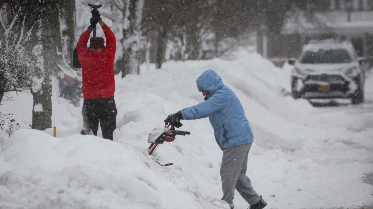 Buffalo residents with plows attached to their Jeeps and pickup trucks helped clear side streets. People walked a mile or more in lanes cut by snow plows to reach convenience stores and supermarkets that were beginning to reopen. Poloncarz, speaking at a press briefing on December 27, urged residents to stay home and the curious to stay away. &quot;Please stay out of the city of Buffalo,&quot; he said. (Image: Reuters)