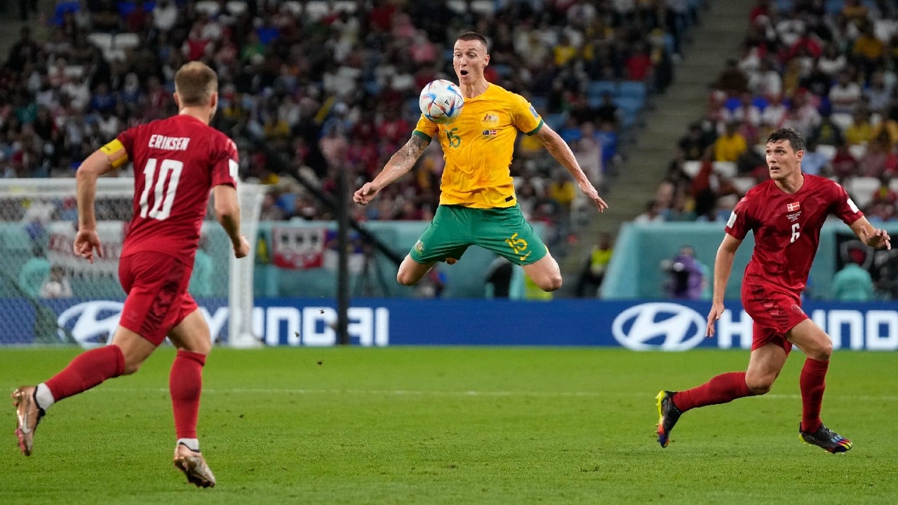 Australia's Mitchell Duke controls the ball during the World Cup group D soccer match between Australia and Denmark, at the Al Janoub Stadium in Al Wakrah, Qatar. (Source: AP)