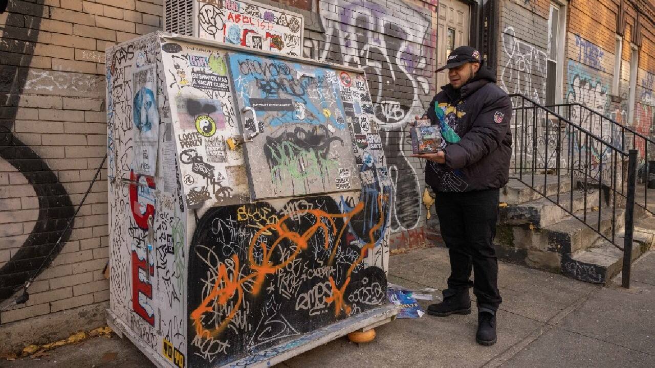 The artist builds collectibles based on the most banal of urban scenes, &quot;the little things that we pass by every day&quot; and pay no attention to, but which collectively form the unique cityscape that is New York. One of his first signature works was a rendering of a simple white commercial ice box -- the kind that sits outside corner groceries, the words &quot;ICE&quot; in block red letters on its side, and often covered in graffiti, which Cortes reproduces with meticulous detail. (Image: AFP)