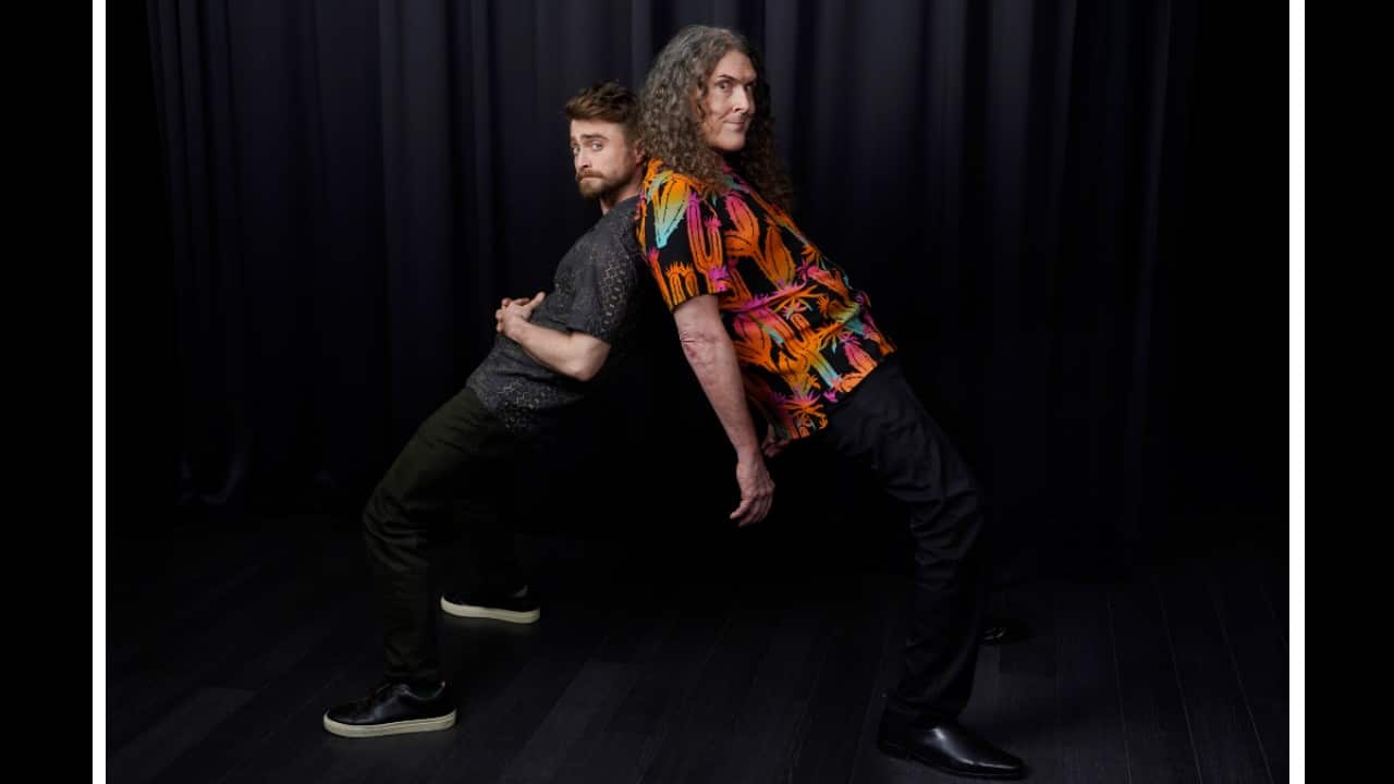 That path often meant a mix of theaters and streaming, as Daniel Radcliffe and “Weird Al” Yankovic showed with their good-natured biopic of the comedian-musician. (Image: AP)