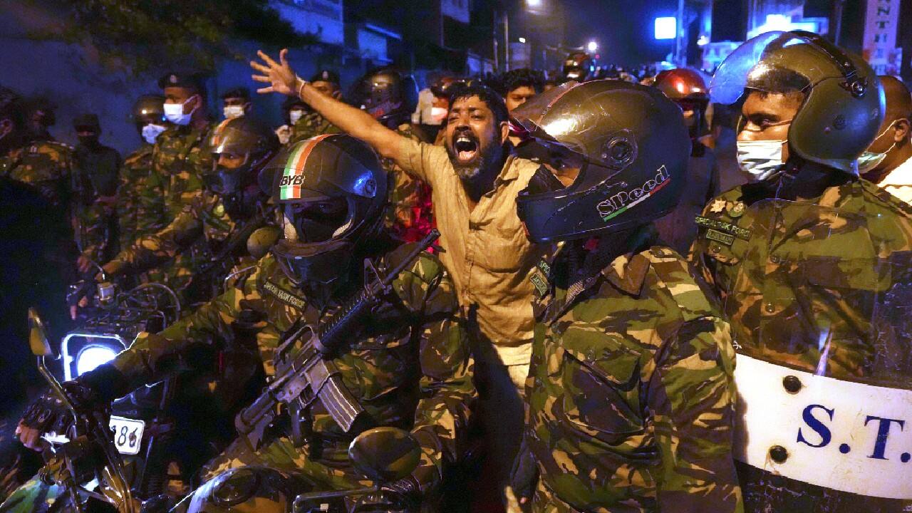 A Sri Lankan man shouts anti-government slogans during a protest outside Sri Lankan president's private residence on the outskirts of Colombo, Sri Lanka, March 31. Political turmoil hit debt-laden Sri Lanka, where protesters broke into President Gotabaya Rajapaska's residence and forced him into resigning after fleeing abroad. (Image: AP)